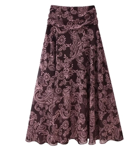 Close-up of dark brown paisley chiffon maxi skirt with elegant pleated waist detail