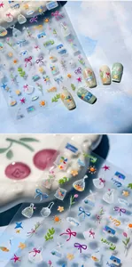 Macro detail of cartoon spring flower nail stickers with tulip and daisy patterns