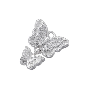 Macro shot of 18K gold plated double butterfly pendant with sparkling zircon accents