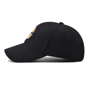 Classic black baseball cap with golden S embroidery and breathable mesh cotton fabric