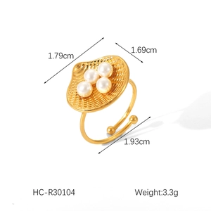 Detailed view of gold shell heart open ring dimensions with pearls and sizing guides
