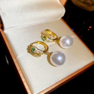 14K gold plated panther hoop earrings with white round pearl pendants and green stone eyes