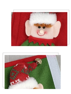 Detail view of Christmas gnome stocking with felt fabric and metallic bell accent
