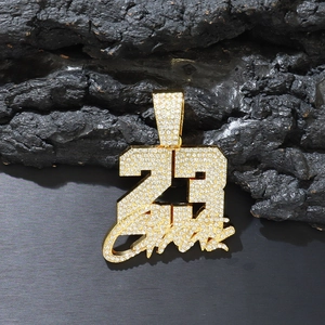 Iced-out gold number 23 pendant necklace with sparkling rhinestones on cuban link chain