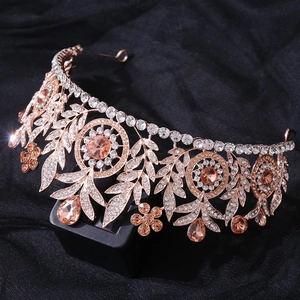 Macro detail of rose gold bridal crown featuring sparkling champagne rhinestones