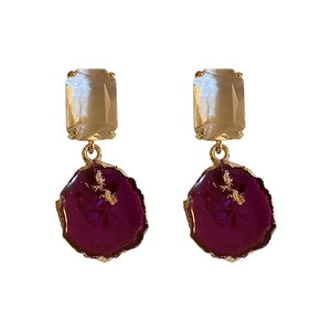 French vintage purple stone earrings with gold leaf and cubic zirconia on white background