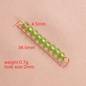 Green faceted crystal birthstone connector with gold rings for jewelry making, 38.5mm