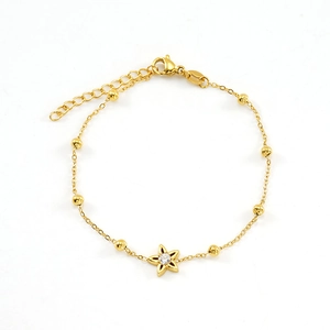 Bracelet fleur en acier titane plaqué or 18 carats avec zircon blanc brillant