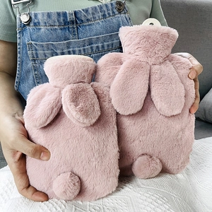 Pink rabbit plush hot water bottle with long ears and tail in large and small sizes