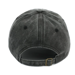 Detail of adjustable metal buckle and strap on back of washed charcoal baseball cap
