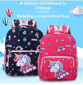 Detail of dark blue and rose red unicorn backpacks with side mesh pockets for kids