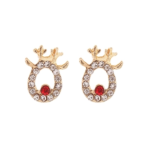 Close-up of golden reindeer earrings with red central stone and sparkling rhinestones