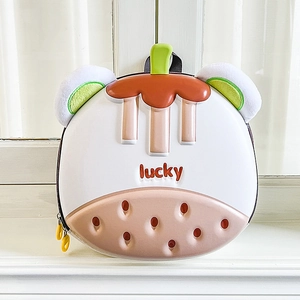 Detail of cartoon shell backpack with lucky text, plush ears and green handle