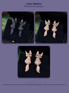 Detailed view of fox-shaped earrings with pink and blue crystals on metal base