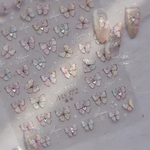 Detail of MS 572 butterfly nail art stickers with crystal accents and purple gradients
