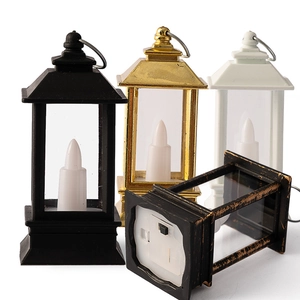 Farolillos LED decorativos vintage en negro, oro y blanco con detalle de batería