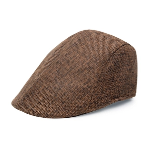 Close-up of brown linen texture and woven fabric detail on a vintage flat cap