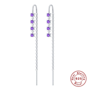 Detailed macro view of S925 sterling silver tassel earrings with four purple gemstones