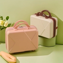 Mini makeup suitcases in pink and beige with textured hardshell and sturdy handles