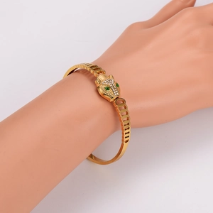 Vintage hollow 304 stainless steel leopard head gold bangle with green emerald eyes