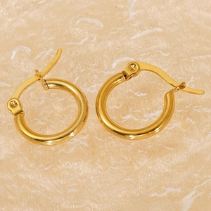 Macro detail of high-polished 18K gold plated stainless steel hoop earrings for women