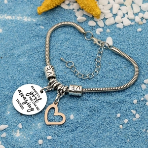 Silver snake chain bracelet with rose gold heart charm and inspirational quote tag