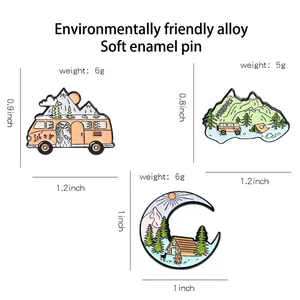 Three-piece outdoor theme enamel pin set featuring mountain camping and forest cabin