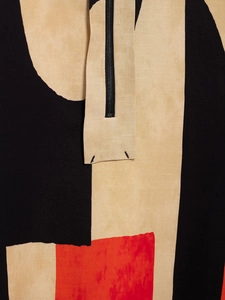 Close-up of invisible black zipper on abstract patterned cotton-linen blend fabric