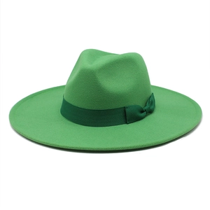 Detailansicht hellgrüner Fedora-Hut mit dunkelgrünem Ripsband und eleganter Schleife