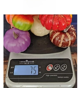 Detailed view of lightweight foam mini pumpkins weighing 75g for autumn home decor
