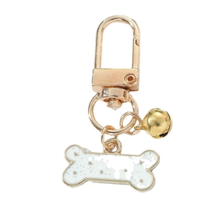 Christmas bone keychain with bell and golden D-ring clasp for festive pet accessories