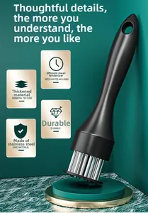 Detail of ergonomic handle and stainless steel needles for professional meat tenderizing
