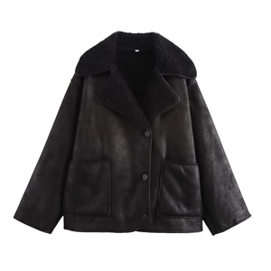 Detail view of black faux suede jacket with plush lapel collar and large front pockets