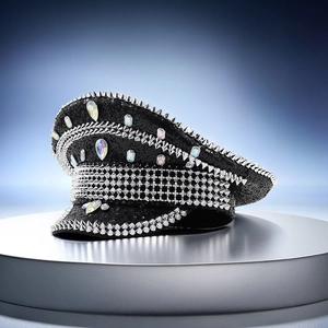 Detail of black sequined captain hat with silver studs and colorful rhinestones
