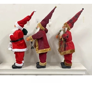 Rear view of three festive 24-inch Santa Claus and gnome dolls in plaid velvet outfits