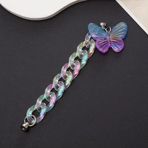 Macro view of iridescent butterfly acrylic chain with vibrant purple gradient finish