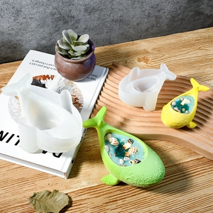 Macro detail of whale-shaped silicone molds for DIY resin candles and ocean-style crafts