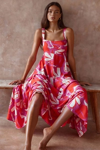 Close-up of bohemian abstract print on summer maxi dress with natural cotton-linen texture