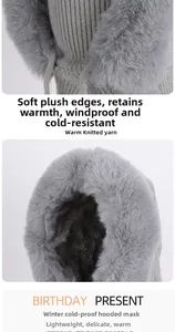 Close-up of grey knitted winter hood with faux fur lining and thick wool texture