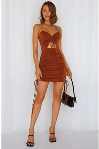 Detail view of the halter neck hollow design and ruched side drawstring on the brown dress