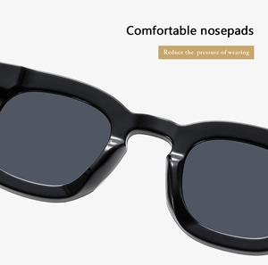 Close-up of comfortable integrated nose pads on black rectangular sunglasses