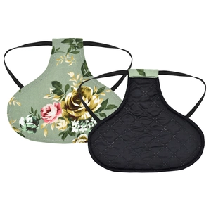 Detailed view of the hen saddle protector with floral print and anti-slip quilted lining