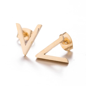 Detailed view of gold V-shaped stainless steel stud earrings set on a white surface