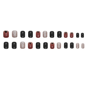 Short black and burgundy press-on nails with heart cutout and silver glitter accents
