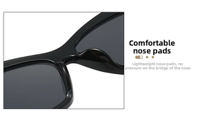 Detail of comfortable integrated nose pads on black square frame cat-eye sunglasses