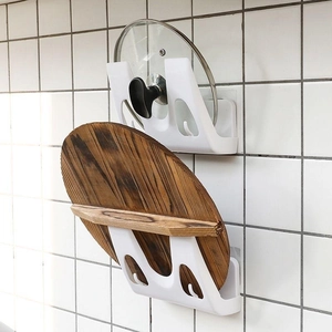Gedetailleerd overzicht van de witte plastic wandgemonteerde dekselhouder keuken!