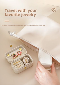 Mini cream PU leather travel jewelry box with dedicated ring slots and earring panel