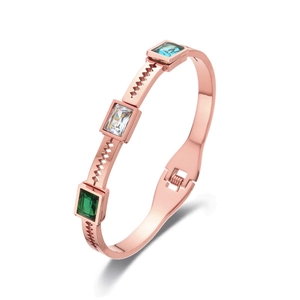 Rose gold stainless steel bracelet with three-color rectangular zircons on white background