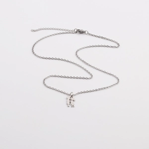 Minimalist silver stainless steel necklace with hollow lovers embrace pendant design