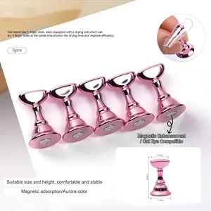 Detail view of pink metallic nail art display stand with magnetic base for practice
